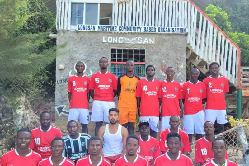 The LongSan Maritime football team in red jerseys